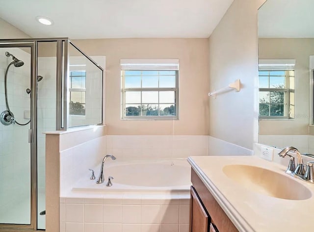 5917 Coquyt Dr, Mount Dora, FL 32757 - bathroom featuring vanity, a stall shower, and a bath