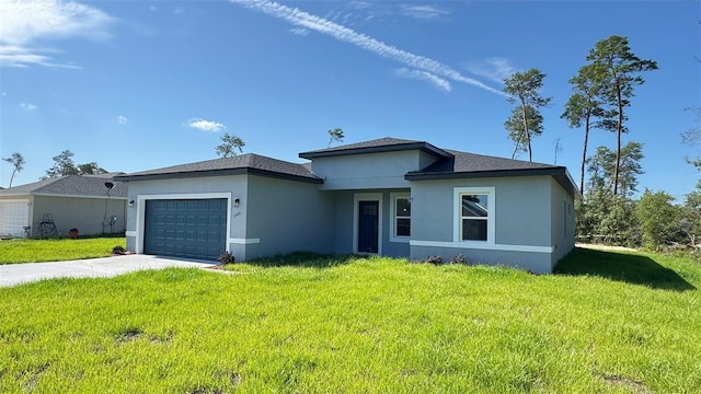2500 SW 156th Ln Rd, Ocala, FL 34473 - view of front of house with an attached garage, stucco siding, a front yard, and driveway