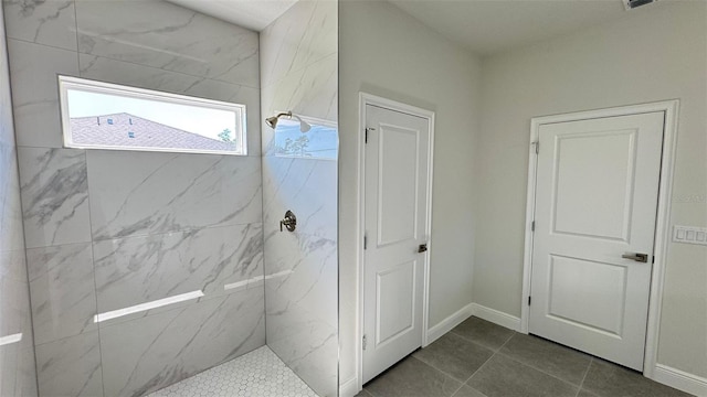 2500 SW 156th Ln Rd, Ocala, FL 34473 - bathroom with a marble finish shower and tile patterned flooring