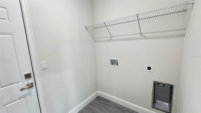 2500 SW 156th Ln Rd, Ocala, FL 34473 - washroom with washer hookup, hookup for an electric dryer, and dark wood finished floors