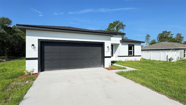 16252 SW 27th Terrace Rd, Ocala, FL 34473 - view of front of house with stucco siding, driveway, and an attached garage