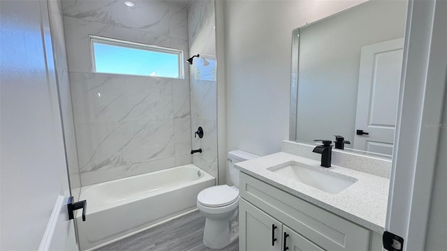 16252 SW 27th Terrace Rd, Ocala, FL 34473 - bathroom with vanity, shower / tub combination, and wood finished floors