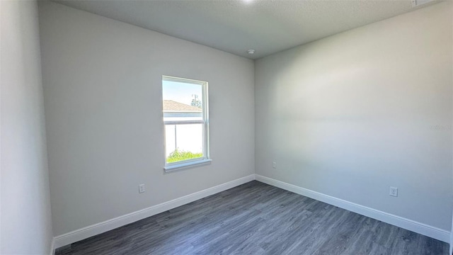 16252 SW 27th Terrace Rd, Ocala, FL 34473 - unfurnished room with dark wood-style flooring