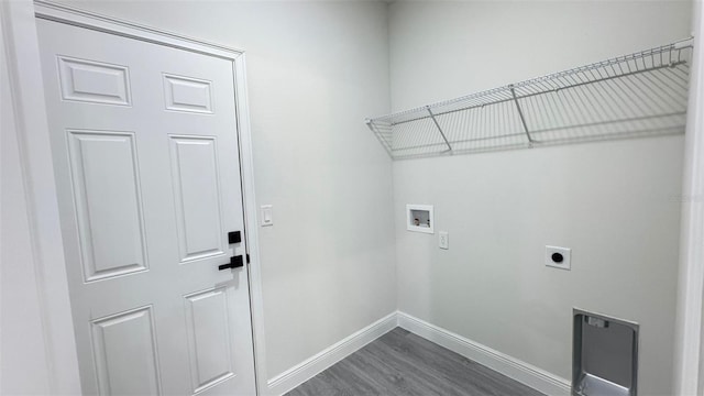 16252 SW 27th Terrace Rd, Ocala, FL 34473 - laundry area with electric dryer hookup, washer hookup, and dark wood-style floors