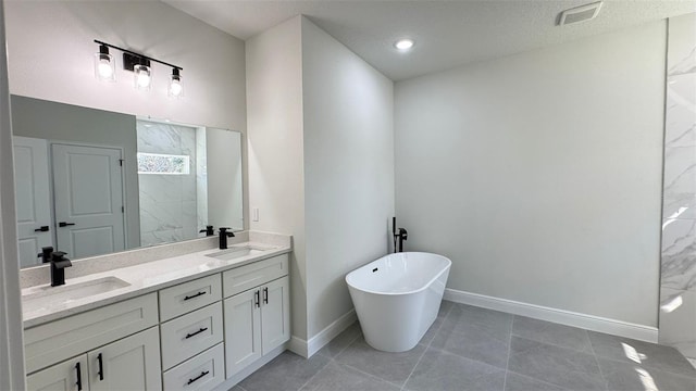 16252 SW 27th Terrace Rd, Ocala, FL 34473 - full bathroom featuring a freestanding bath, double vanity, and a marble finish shower
