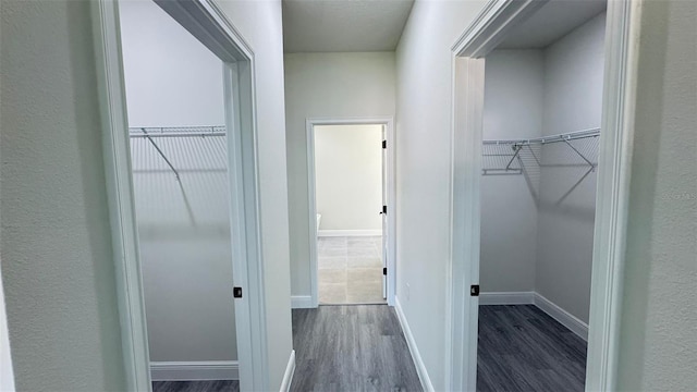16252 SW 27th Terrace Rd, Ocala, FL 34473 - spacious closet with dark wood-style floors