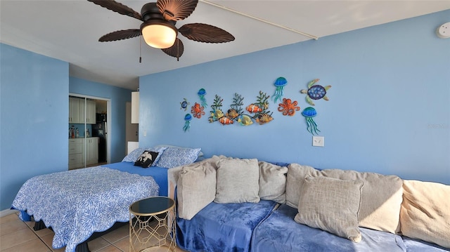 1233 N Atlantic Ave Unit 1020, Daytona Beach, FL 32118 - bedroom with tile patterned floors and ceiling fan