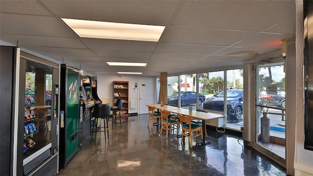1233 N Atlantic Ave Unit 1020, Daytona Beach, FL 32118 - dining space with a drop ceiling