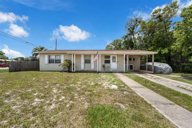 565 S Floyd Cir, Deltona, FL 32725 - single story home with a porch and driveway