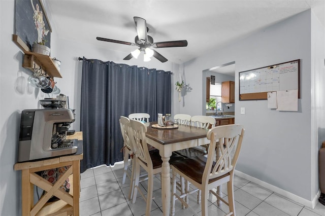 565 S Floyd Cir, Deltona, FL 32725 - dining space with light tile patterned floors and ceiling fan