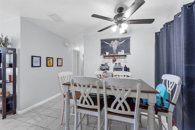 565 S Floyd Cir, Deltona, FL 32725 - dining room with light tile patterned floors and ceiling fan
