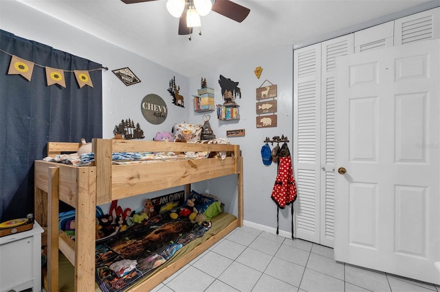 565 S Floyd Cir, Deltona, FL 32725 - bedroom featuring tile patterned flooring, a closet, and ceiling fan