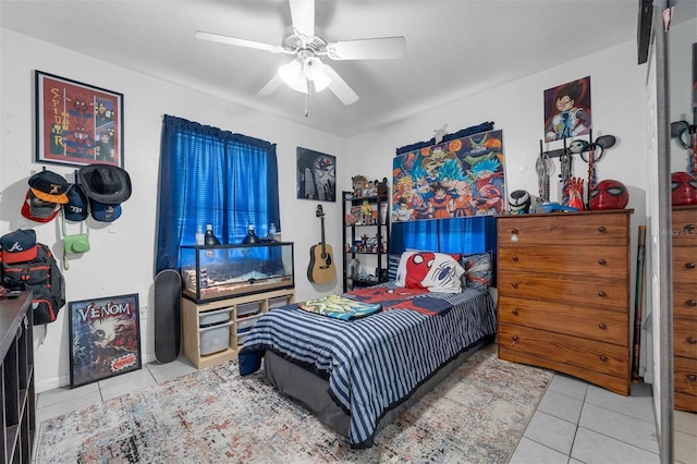 565 S Floyd Cir, Deltona, FL 32725 - tiled bedroom featuring a ceiling fan