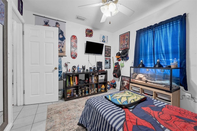 565 S Floyd Cir, Deltona, FL 32725 - bedroom with tile patterned flooring and ceiling fan