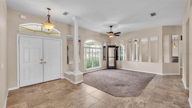 1455 Royal Forest Loop, Lakeland, FL 33811 - entryway featuring decorative columns and a ceiling fan