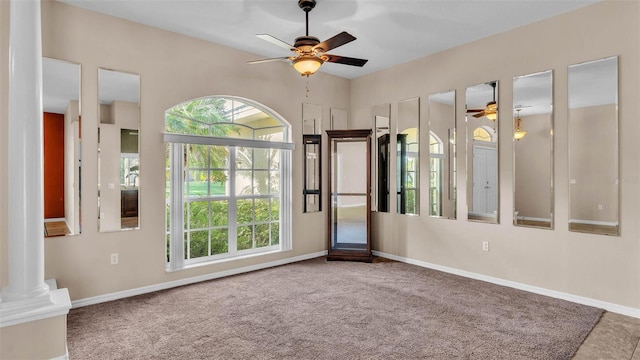 1455 Royal Forest Loop, Lakeland, FL 33811 - carpeted spare room with ceiling fan and ornate columns