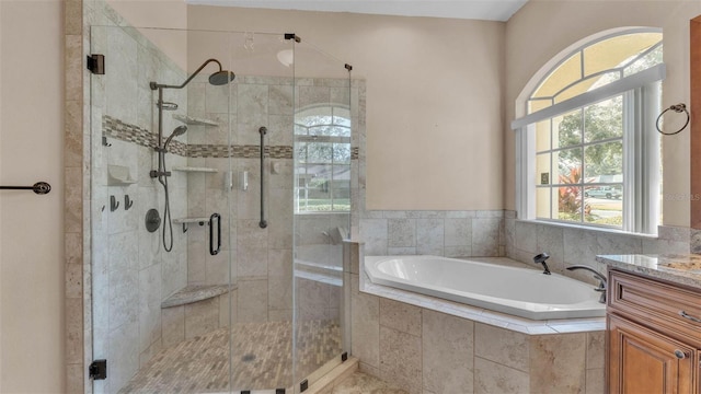 1455 Royal Forest Loop, Lakeland, FL 33811 - full bath featuring a bath, a stall shower, and vanity