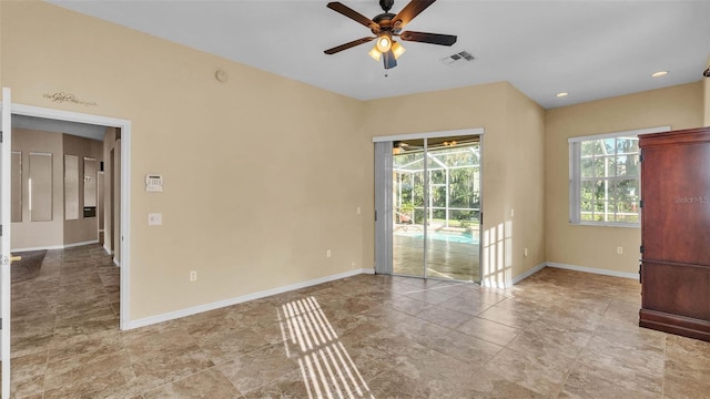 1455 Royal Forest Loop, Lakeland, FL 33811 - spare room with a ceiling fan and recessed lighting