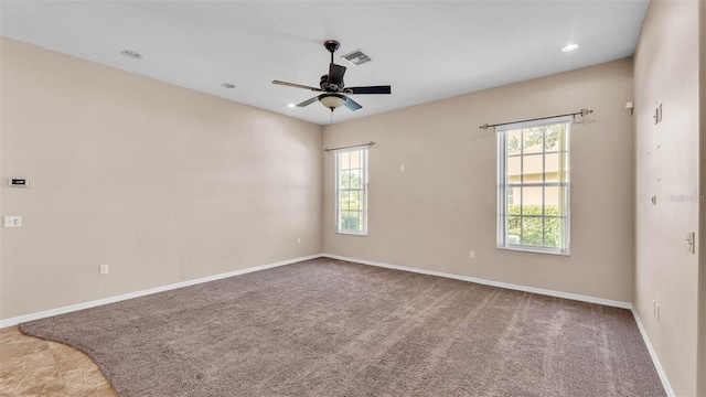 1455 Royal Forest Loop, Lakeland, FL 33811 - unfurnished room featuring healthy amount of natural light, a ceiling fan, recessed lighting, and carpet flooring