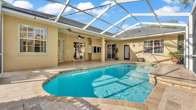 1455 Royal Forest Loop, Lakeland, FL 33811 - outdoor pool with ceiling fan, a patio area, and glass enclosure