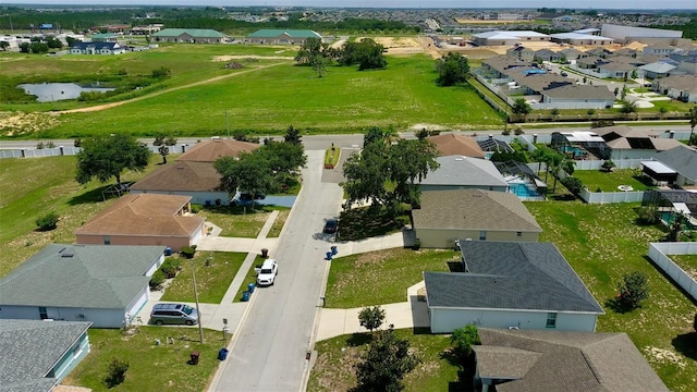 130 Winsor Ave, Davenport, FL 33837 - aerial view of property and surrounding area with nearby suburban area and a large body of water