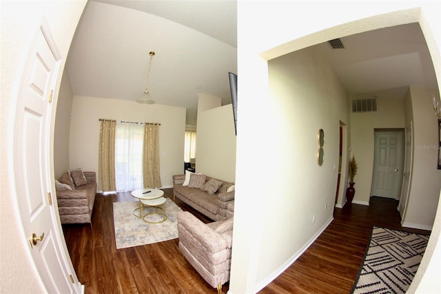 130 Winsor Ave, Davenport, FL 33837 - living room with wood finished floors and vaulted ceiling