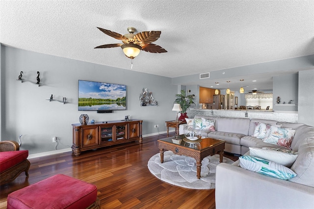 4 Oceans W Blvd Unit 502D, Daytona Beach Shores, FL 32118 - living area featuring wood finished floors, ceiling fan, and a textured ceiling