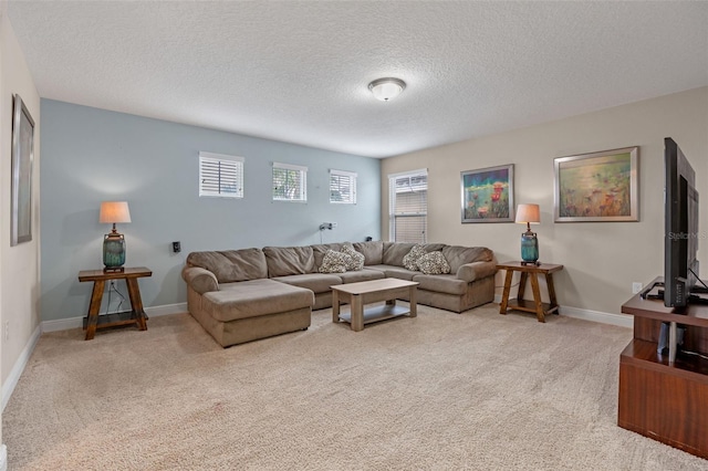 5172 Oakbourne Ave, Davenport, FL 33837 - living area featuring carpet floors and a textured ceiling