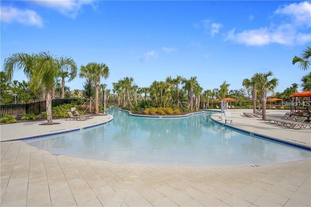 5172 Oakbourne Ave, Davenport, FL 33837 - community pool with a patio area