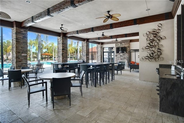 5172 Oakbourne Ave, Davenport, FL 33837 - view of patio with ceiling fan and an outdoor pool