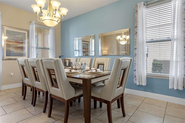 5172 Oakbourne Ave, Davenport, FL 33837 - dining space with a chandelier and tile patterned flooring