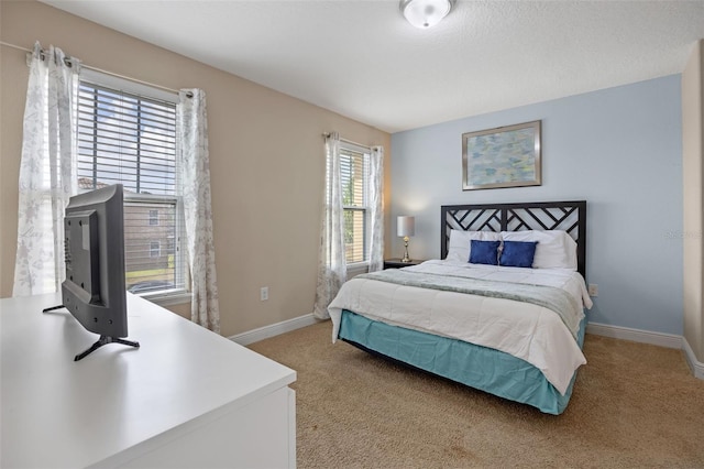 5172 Oakbourne Ave, Davenport, FL 33837 - bedroom with light colored carpet and baseboards