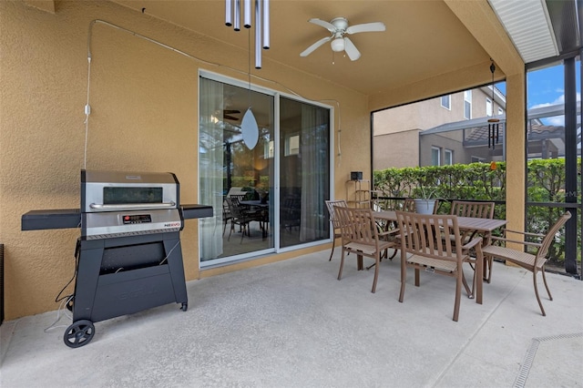 5172 Oakbourne Ave, Davenport, FL 33837 - view of patio / terrace with outdoor dining area, a ceiling fan, and grilling area
