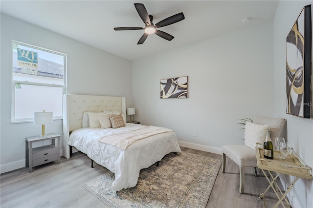 63 W 10th St, Apopka, FL 32703 - bedroom featuring light wood finished floors and ceiling fan
