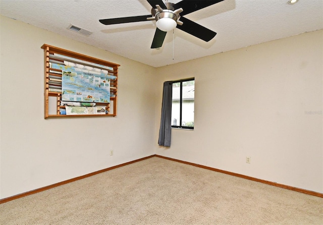 173 Tollgate Br, Longwood, FL 32750 - spare room featuring carpet floors, a ceiling fan, and a textured ceiling