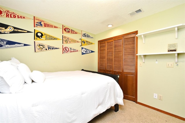 173 Tollgate Br, Longwood, FL 32750 - bedroom featuring a closet, carpet, and a textured ceiling