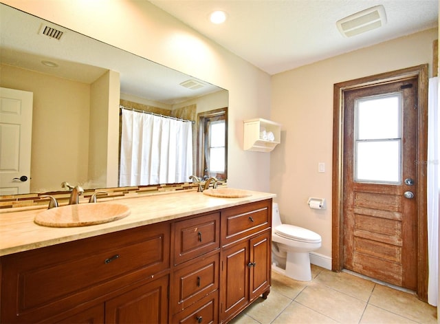 173 Tollgate Br, Longwood, FL 32750 - full bath featuring double vanity, tile patterned floors, and curtained shower