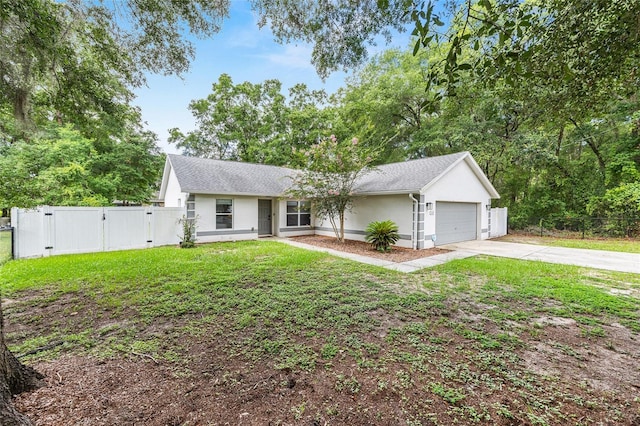 5430 NW 55th Pl, Ocala, FL 34482 - single story home with a gate, a garage, driveway, and stucco siding