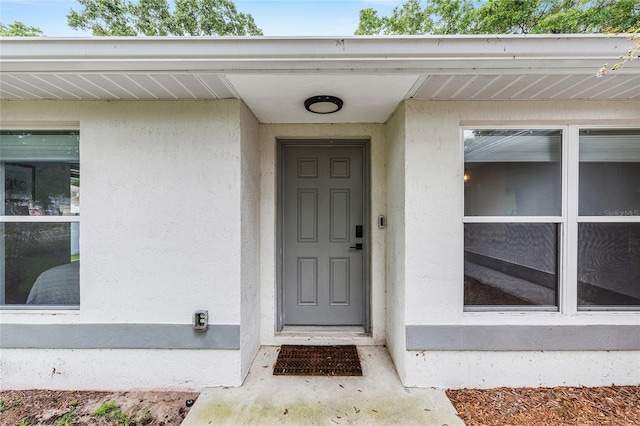 5430 NW 55th Pl, Ocala, FL 34482 - property entrance with stucco siding