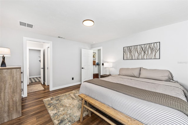 5430 NW 55th Pl, Ocala, FL 34482 - bedroom with dark wood-style flooring and baseboards