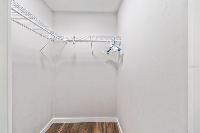 5430 NW 55th Pl, Ocala, FL 34482 - walk in closet featuring dark wood finished floors