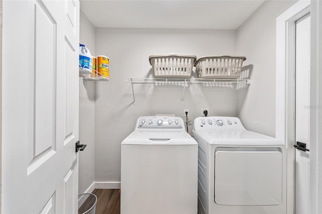 5430 NW 55th Pl, Ocala, FL 34482 - washroom with washer and clothes dryer and dark wood-style floors