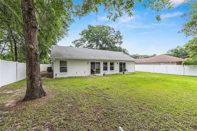 5430 NW 55th Pl, Ocala, FL 34482 - back of house with a fenced backyard