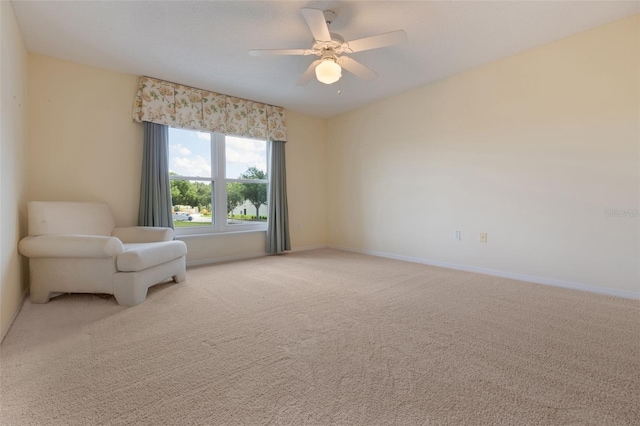 16243 Wilkinson Dr, Clermont, FL 34714 - sitting room featuring carpet and a ceiling fan