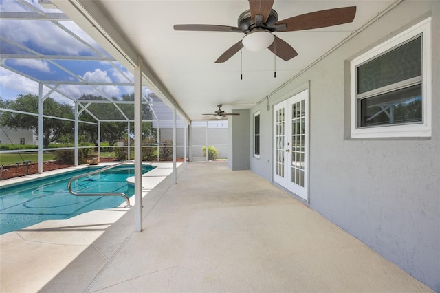16243 Wilkinson Dr, Clermont, FL 34714 - outdoor pool featuring french doors, a patio, ceiling fan, and a lanai