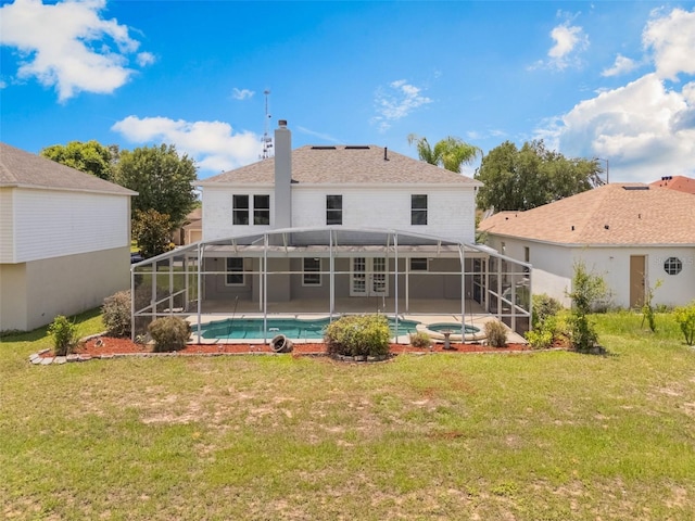 16243 Wilkinson Dr, Clermont, FL 34714 - rear view of house featuring an outdoor pool, a lanai, and a yard