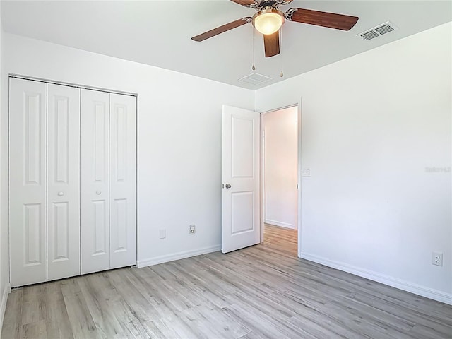1816 Alexander Ave, Sanford, FL 32771 - unfurnished bedroom with light wood-style floors, a closet, and ceiling fan