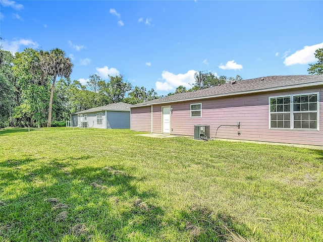 1816 Alexander Ave, Sanford, FL 32771 - back of property featuring a yard