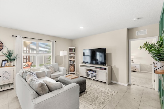 9024 Alba Ln, Kissimmee, FL 34747 - living area with light tile patterned floors and baseboards