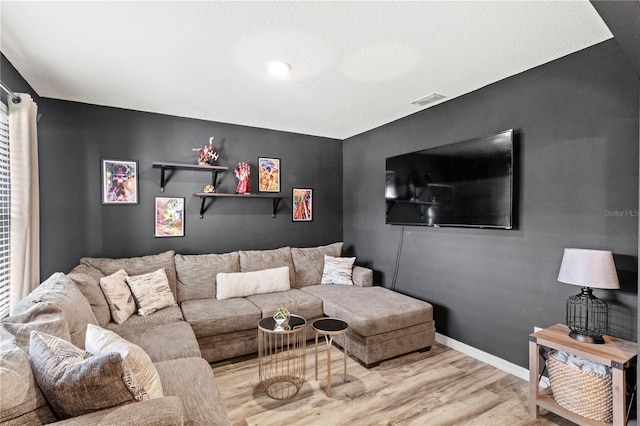 9024 Alba Ln, Kissimmee, FL 34747 - living area featuring wood finished floors and baseboards
